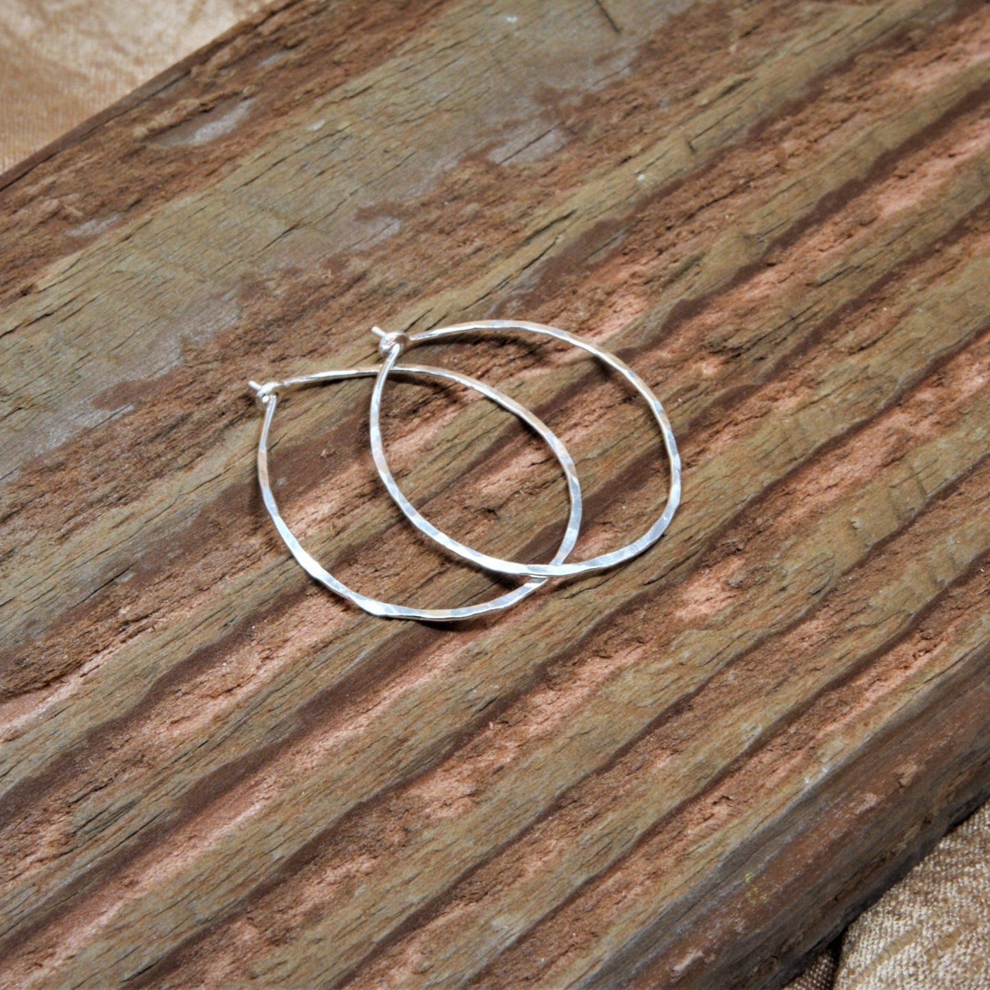 1.25 inch sterling silver oval hammered hoops