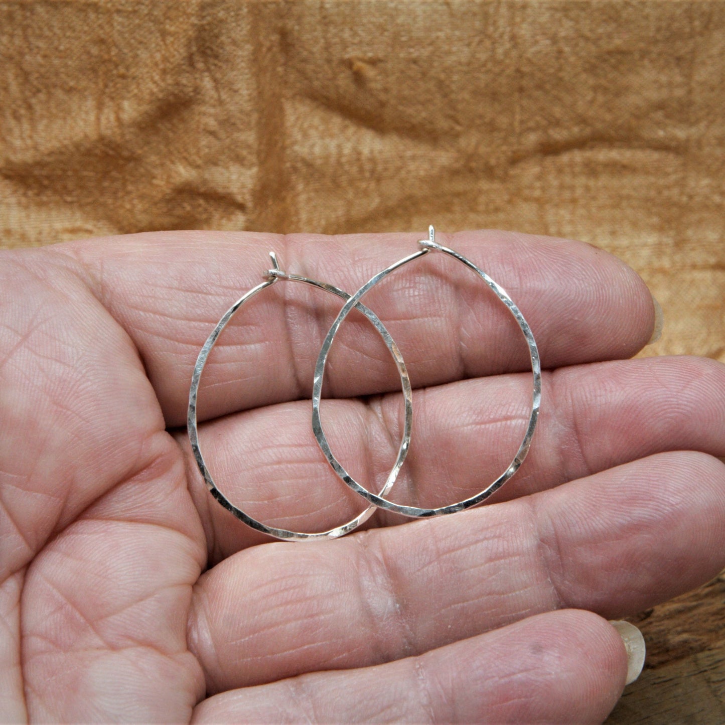 1.25 inch sterling silver oval hammered hoops