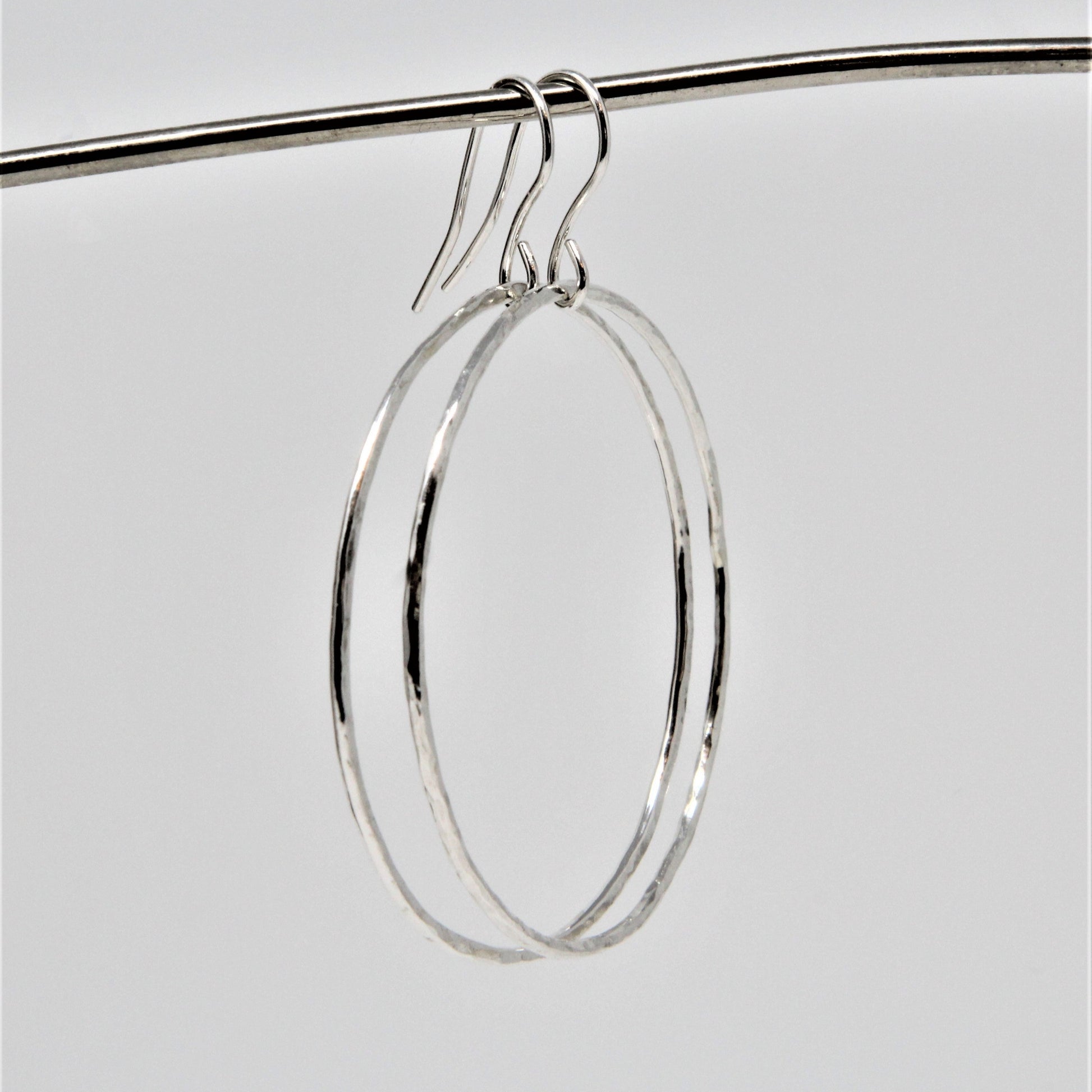 large sterling silver hammered dangle hoops