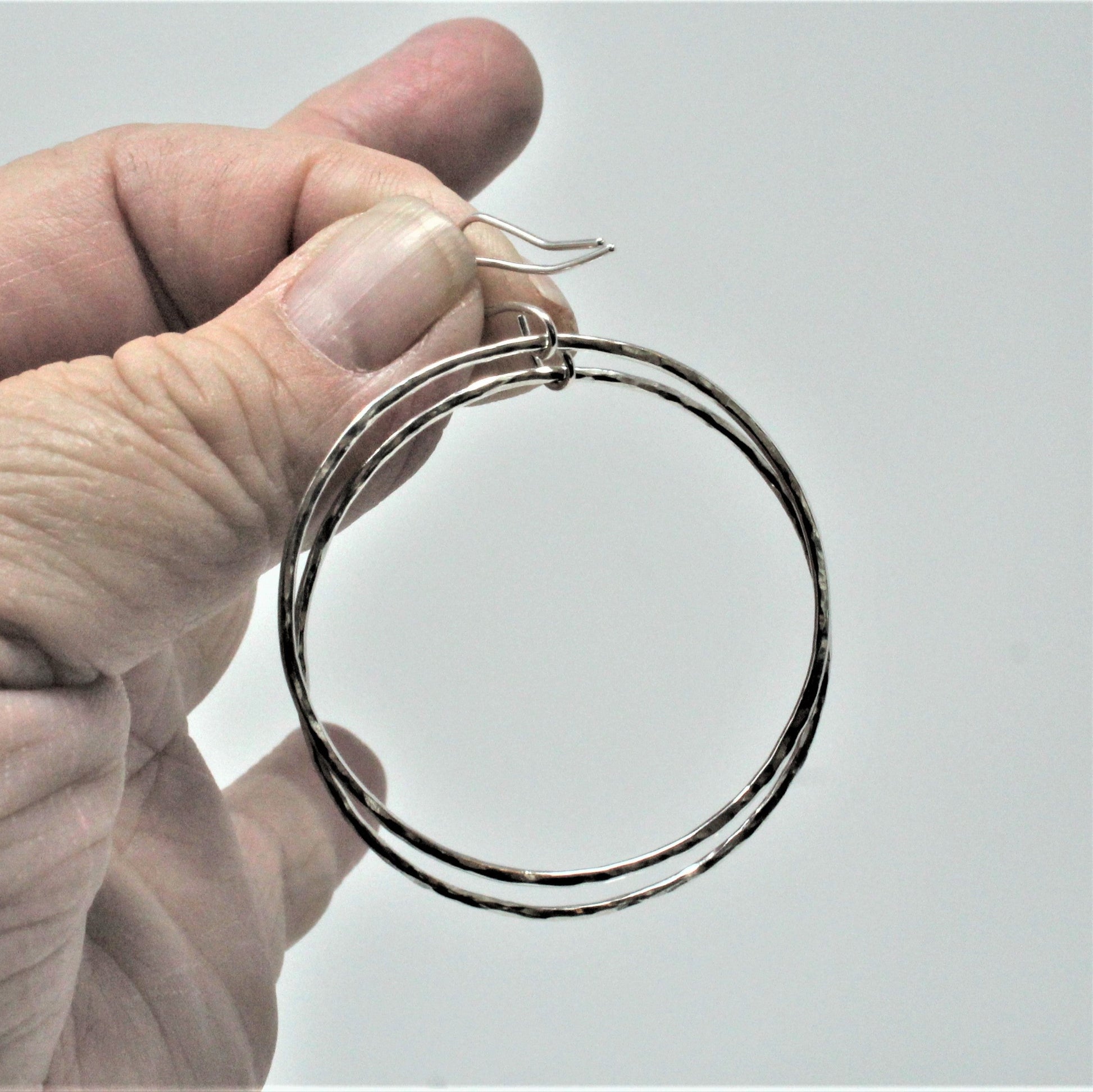 large sterling silver hammered dangle hoops