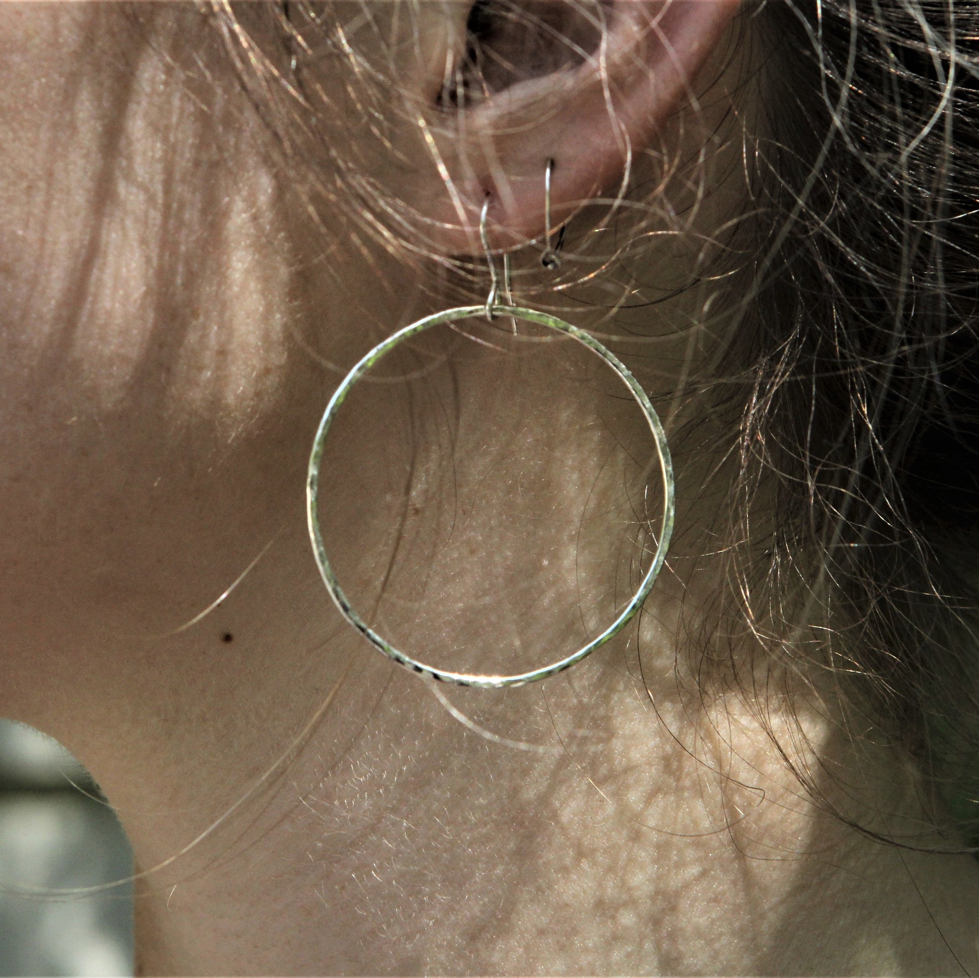 large sterling silver hammered dangle hoops