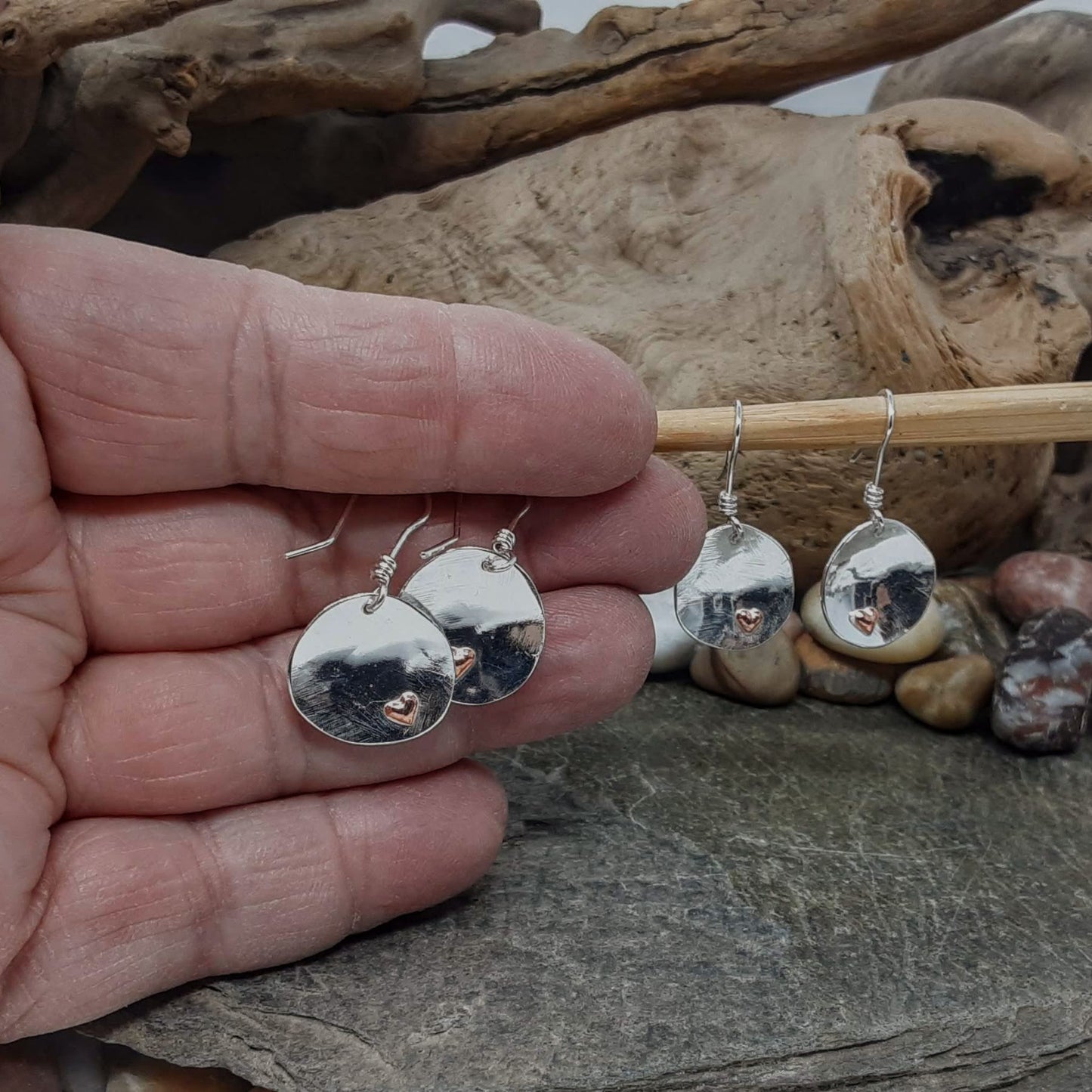 recycled silver discs with copper hearts