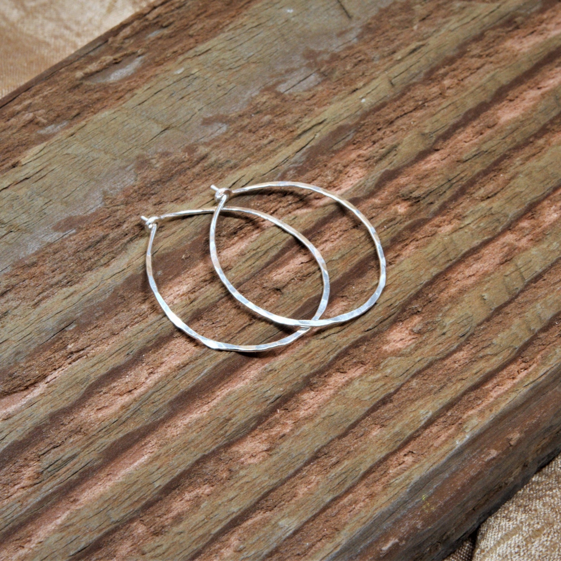 1.25 inch sterling silver oval hammered hoops